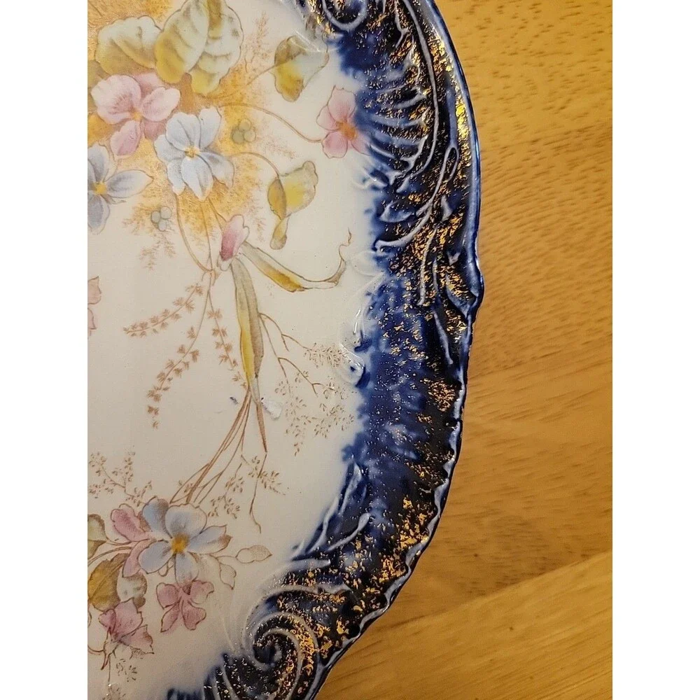 Porcelain 9in plate look/quality of R.S. Prussia Or other fine German Ware